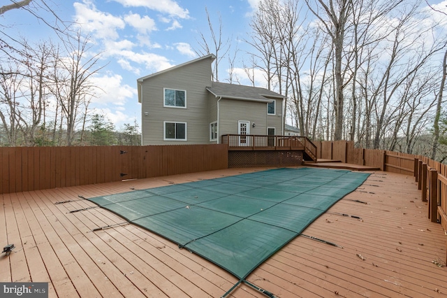 view of pool featuring a wooden deck