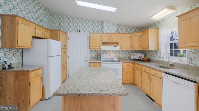 kitchen with a center island, white appliances, exhaust hood, sink, and vaulted ceiling