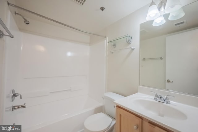 full bathroom with washtub / shower combination, vanity, and toilet