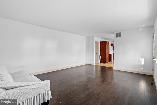 living room featuring dark hardwood / wood-style floors