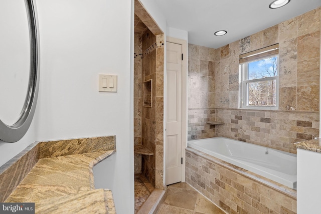 bathroom with tile patterned floors and plus walk in shower