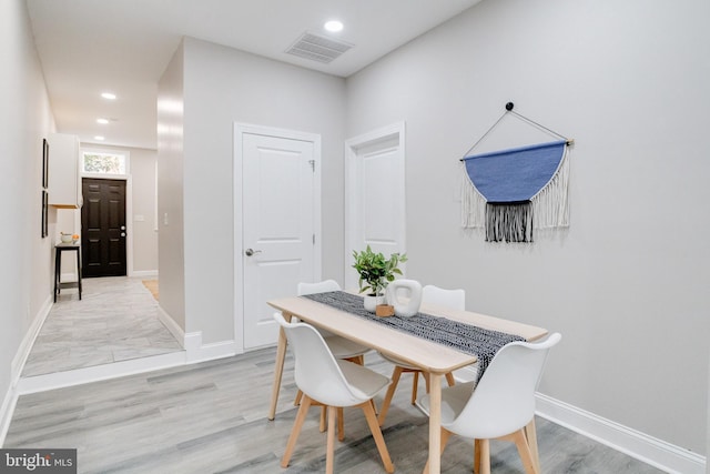 dining area featuring light hardwood / wood-style flooring