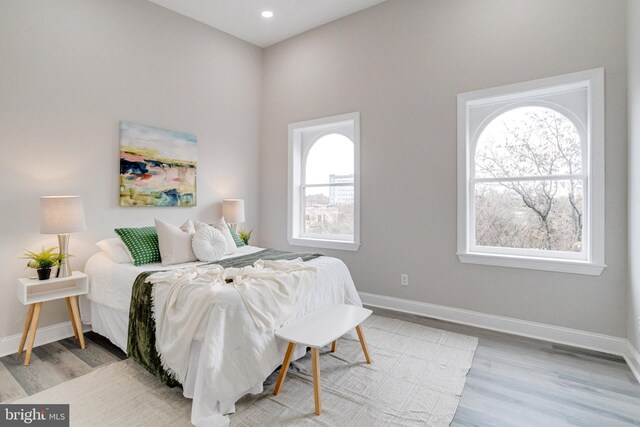 bedroom with light hardwood / wood-style flooring