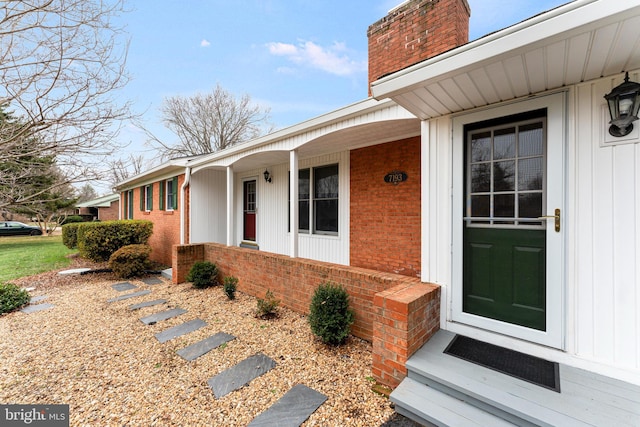 property entrance with a porch