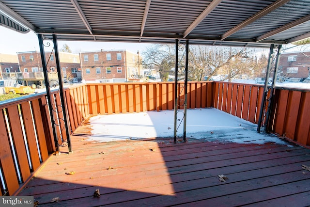 view of snow covered deck