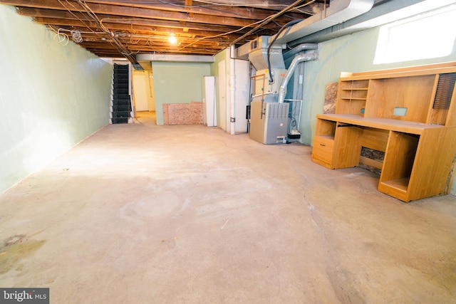 basement featuring heating unit