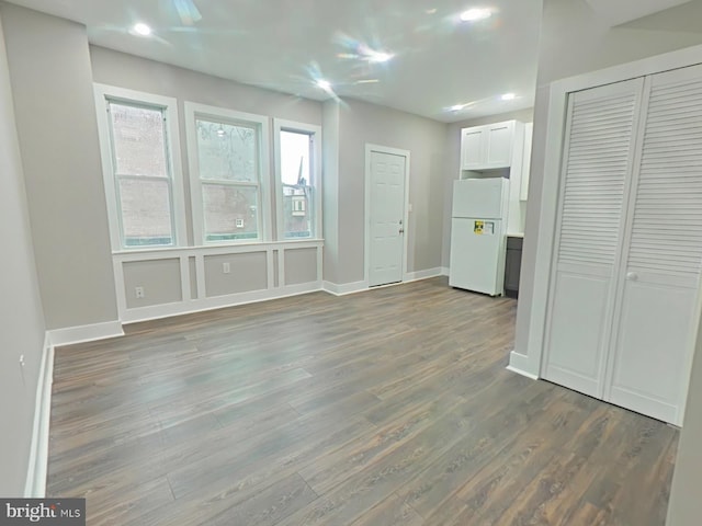 interior space with dark wood-type flooring