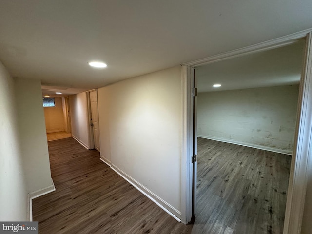 corridor featuring hardwood / wood-style floors