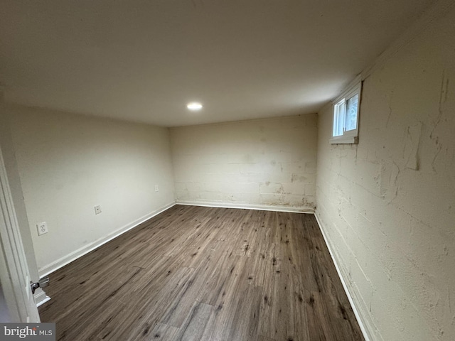 unfurnished room featuring hardwood / wood-style floors