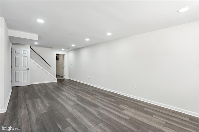 basement featuring dark wood-type flooring