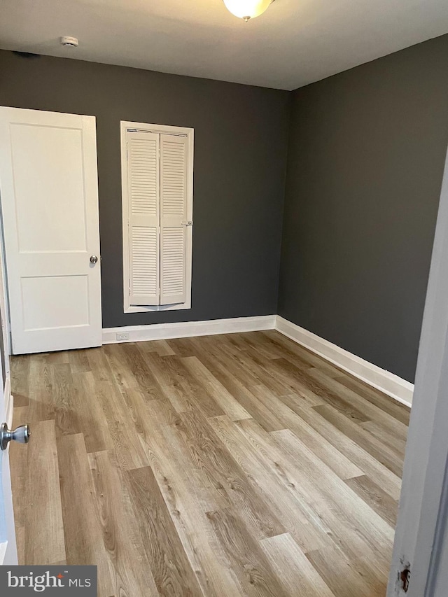 empty room featuring light hardwood / wood-style floors