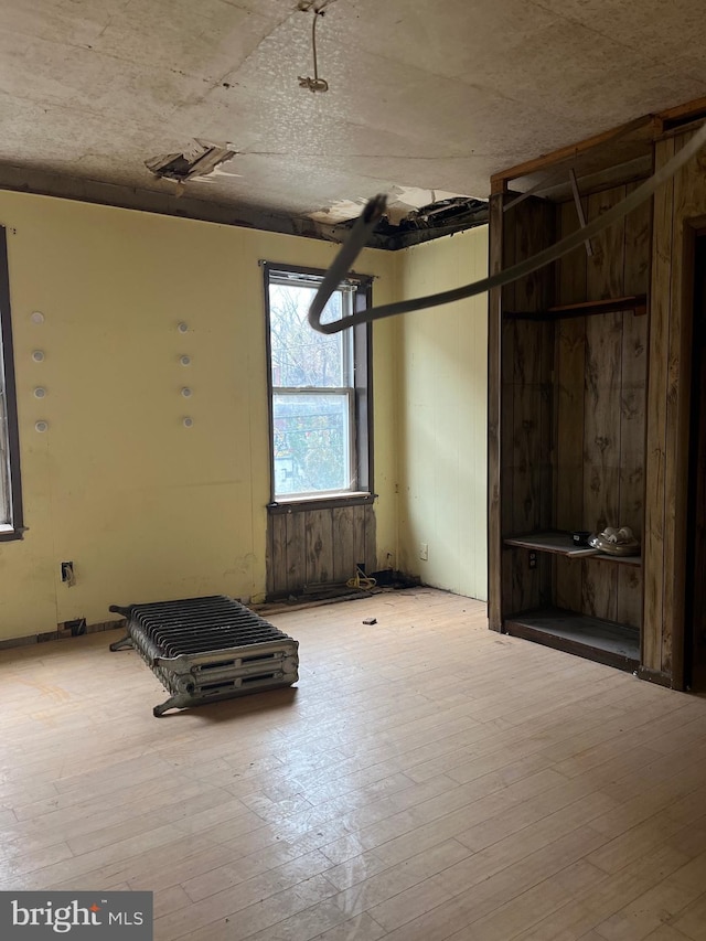 unfurnished dining area with light hardwood / wood-style floors