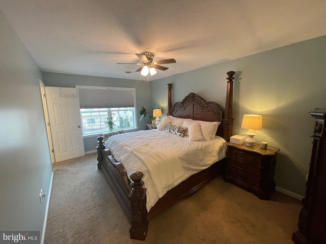 bedroom featuring ceiling fan and carpet floors