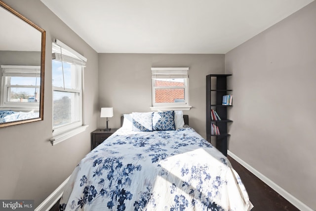 bedroom featuring dark wood-type flooring