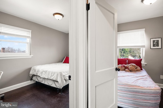 bedroom with hardwood / wood-style floors