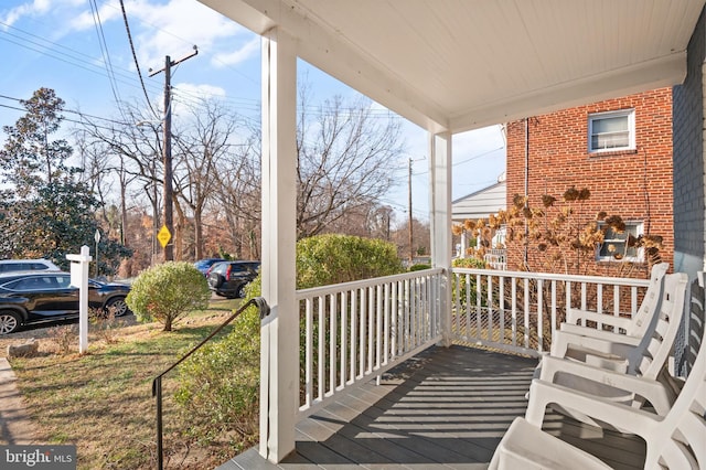 wooden deck featuring a porch