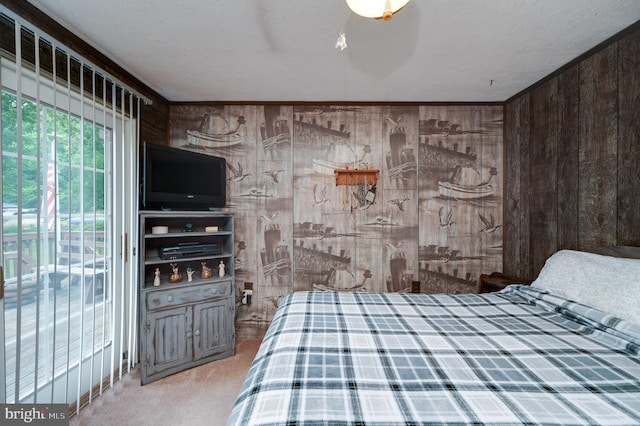 82 Quarry Rd, Birdsboro, PA 19508 - bedroom featuring wood walls, carpet floors, access to outside, and ceiling fan