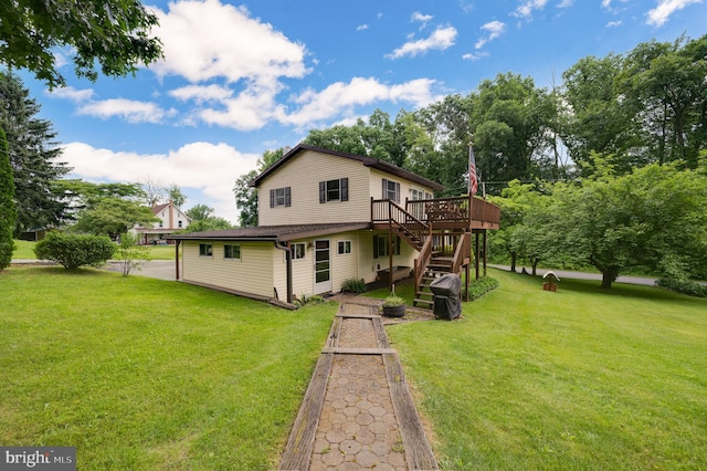 82 Quarry Rd, Birdsboro, PA 19508 - back of house with stairway, a deck, and a lawn