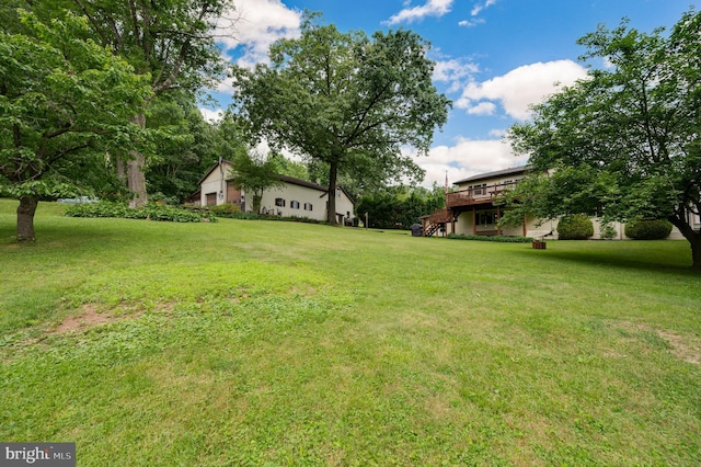 82 Quarry Rd, Birdsboro, PA 19508 - view of green lawn featuring stairway and a deck