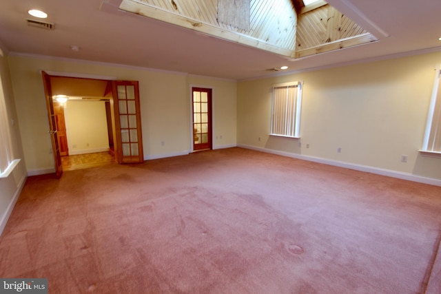 interior space featuring a skylight and crown molding