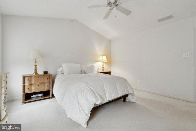 bedroom with carpet floors, ceiling fan, and lofted ceiling