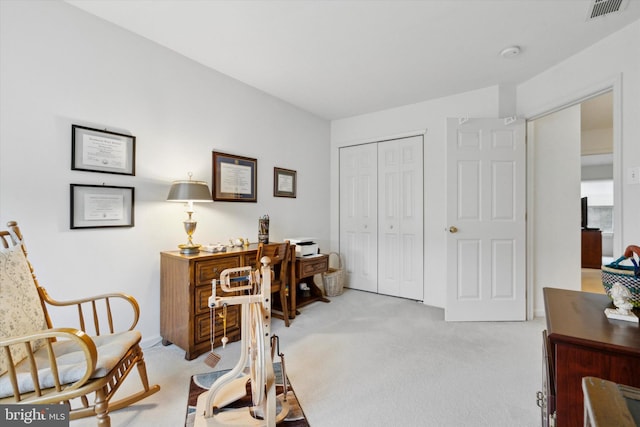 home office with light colored carpet