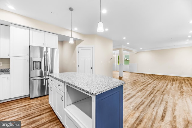 kitchen featuring stainless steel refrigerator with ice dispenser, light hardwood / wood-style floors, white cabinetry, and light stone counters