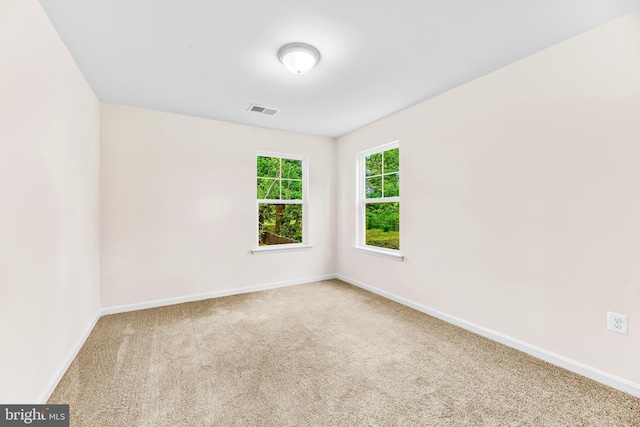 view of carpeted spare room