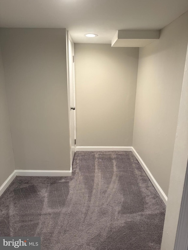 125 Rodney Dr, New Castle, DE 19720 - finished basement with dark colored carpet and baseboards