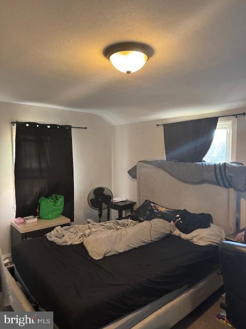 bedroom with a textured ceiling