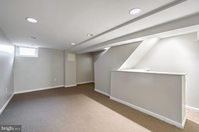 basement with carpet flooring