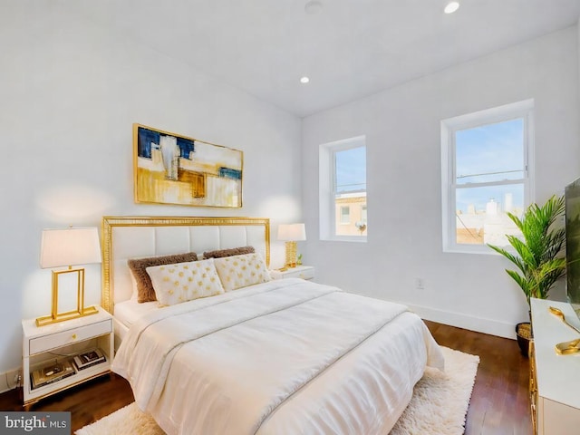 bedroom featuring dark wood-type flooring