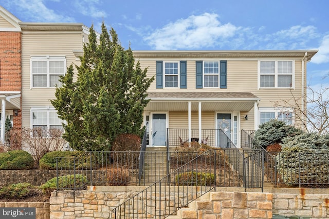 view of front of property featuring covered porch