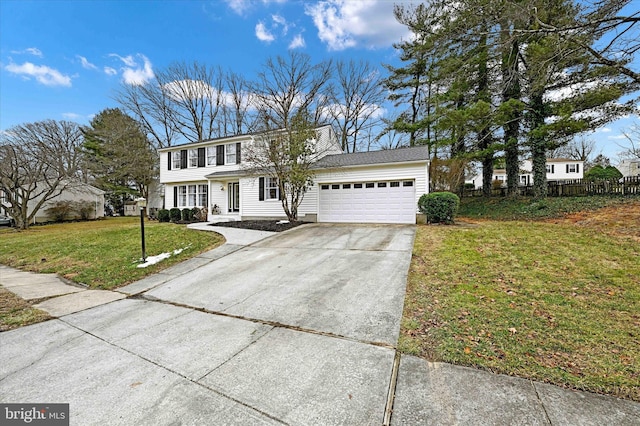 view of front facade featuring a garage and a front lawn