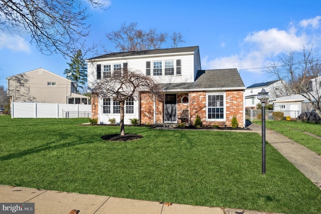 view of front property with a front yard