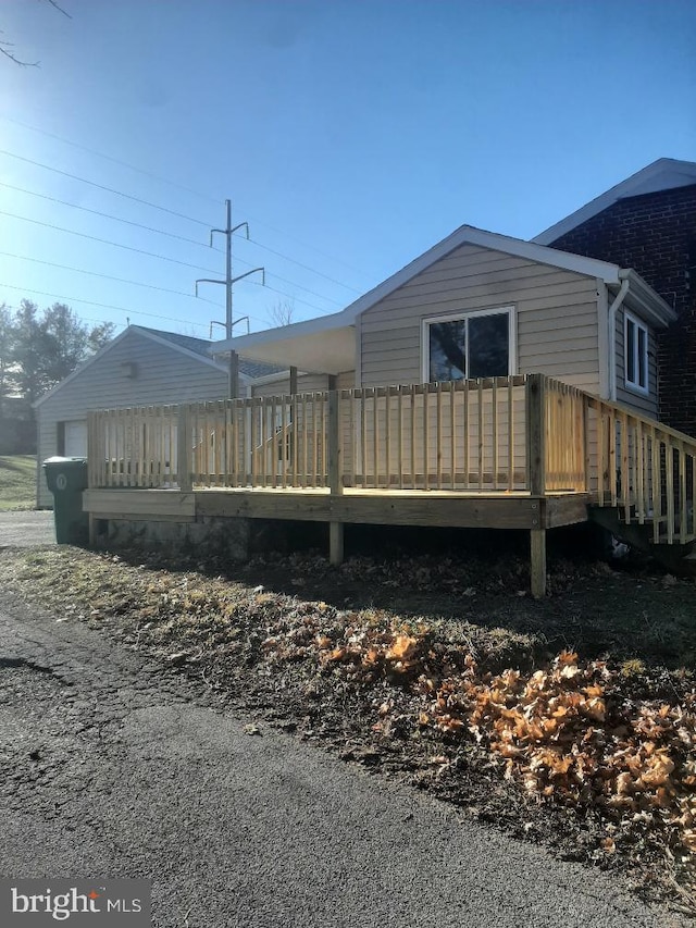 exterior space with a wooden deck