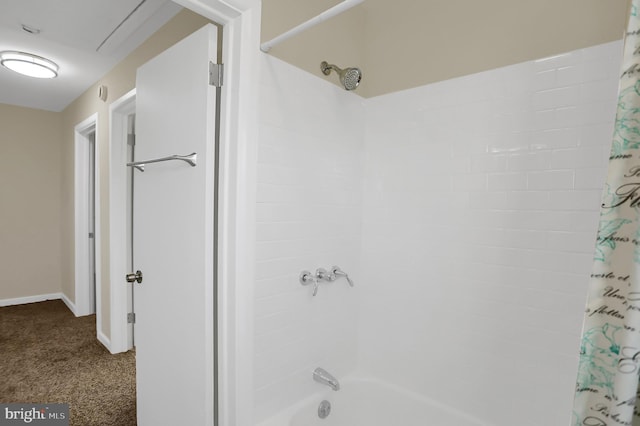 bathroom with shower / tub combo