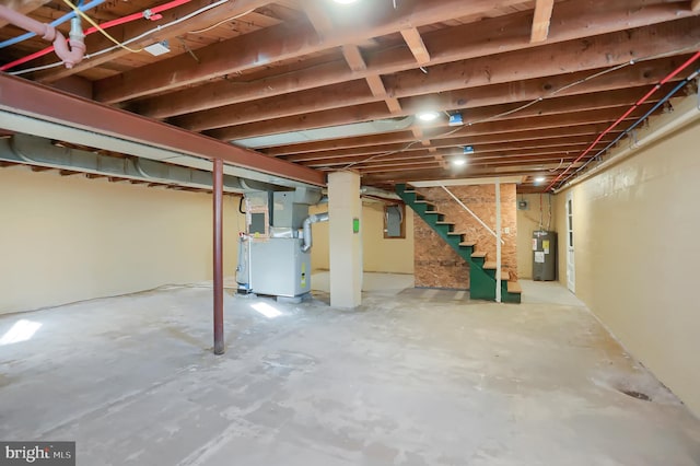 basement with heating unit and water heater