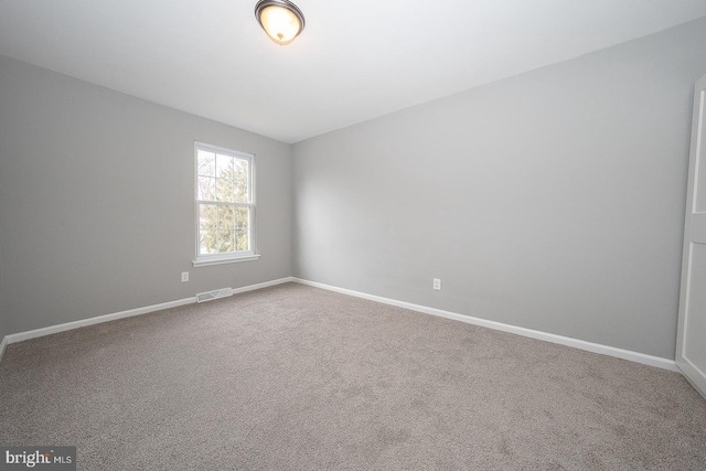 view of carpeted spare room