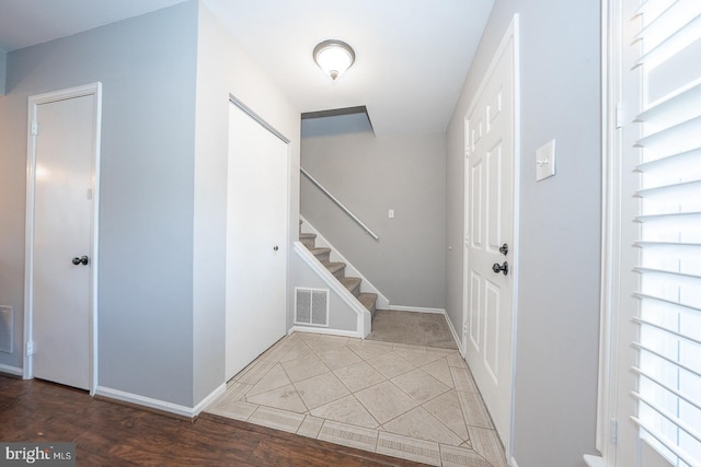 entrance foyer featuring hardwood / wood-style floors