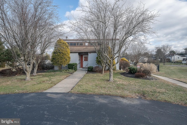 view of front of home with a front yard