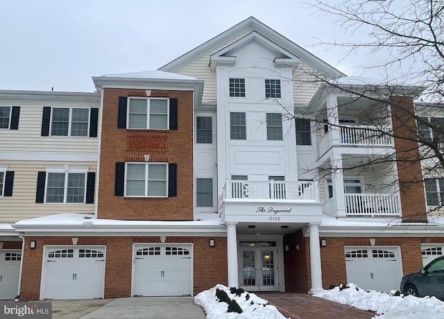 townhome / multi-family property featuring french doors