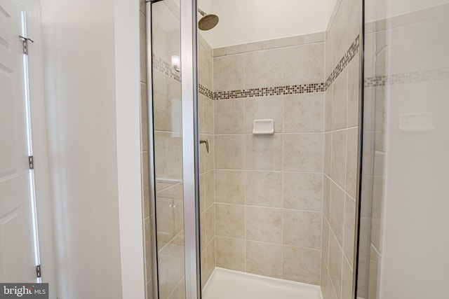 bathroom featuring walk in shower