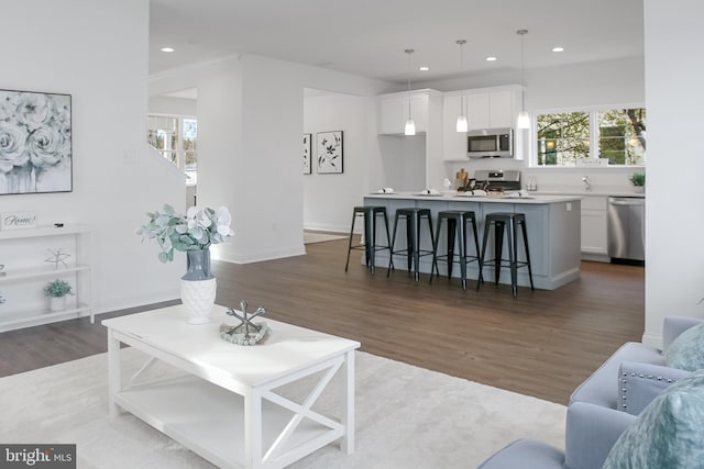 living room featuring dark hardwood / wood-style floors