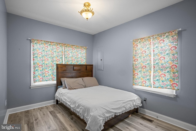 bedroom featuring light hardwood / wood-style floors