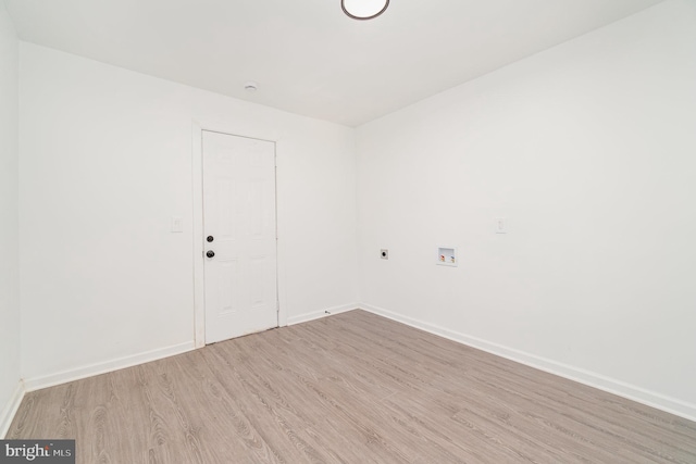 empty room with light hardwood / wood-style floors