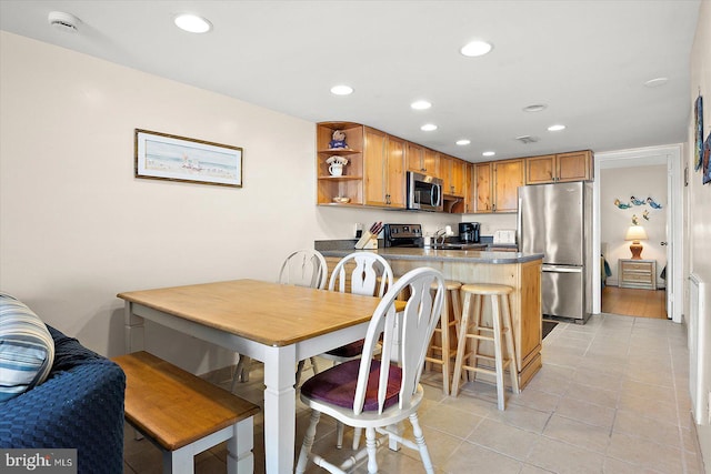 view of tiled dining space