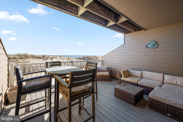 wooden deck featuring an outdoor living space