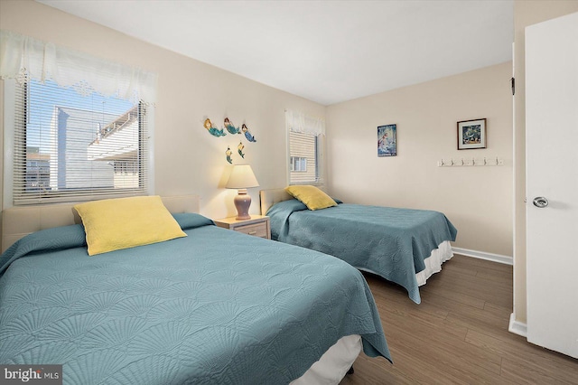 bedroom featuring wood-type flooring