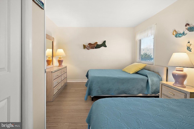 bedroom with light wood-type flooring